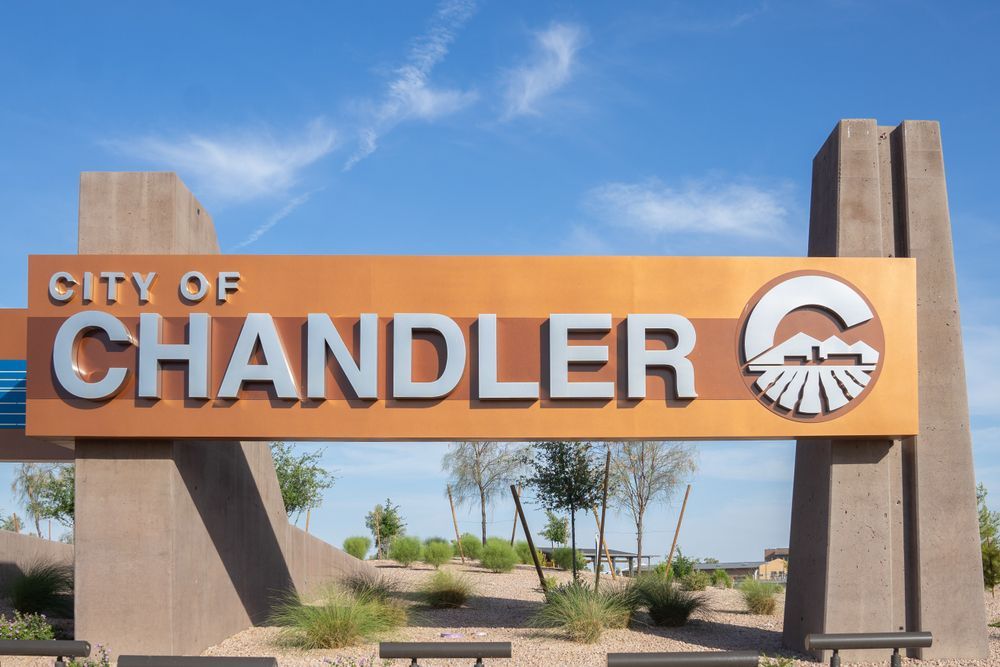A sign that says city of chandler on it