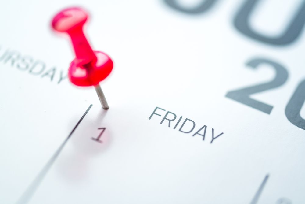A calendar with a red pin pointing to friday