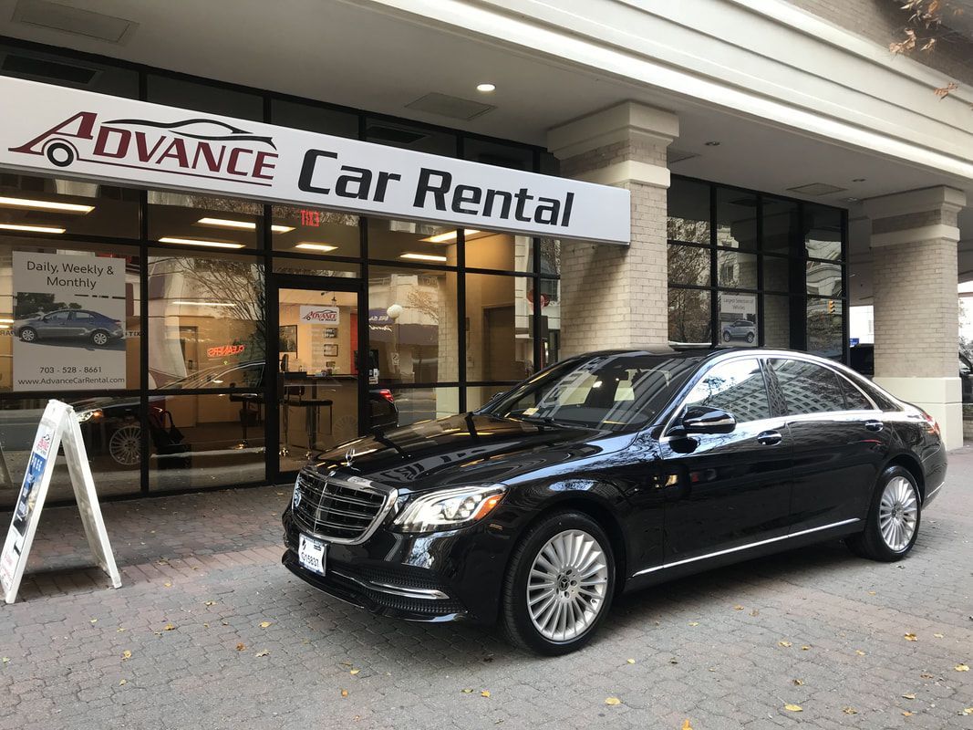 Black sedan parked outside