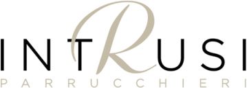 Logo stilizzato “INTRUSI” con la scritta “PARRUCCHIERI” sottostante, in nero e beige su sfondo bianco.