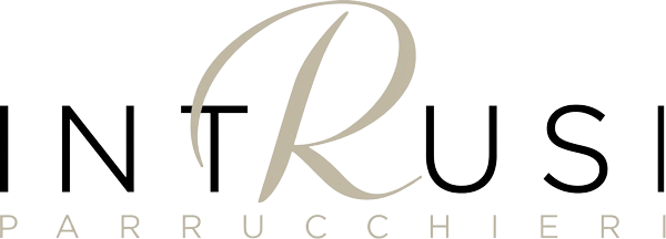 Logo stilizzato “INTRUSI” con la scritta “PARRUCCHIERI” sottostante, in nero e beige su sfondo bianco.