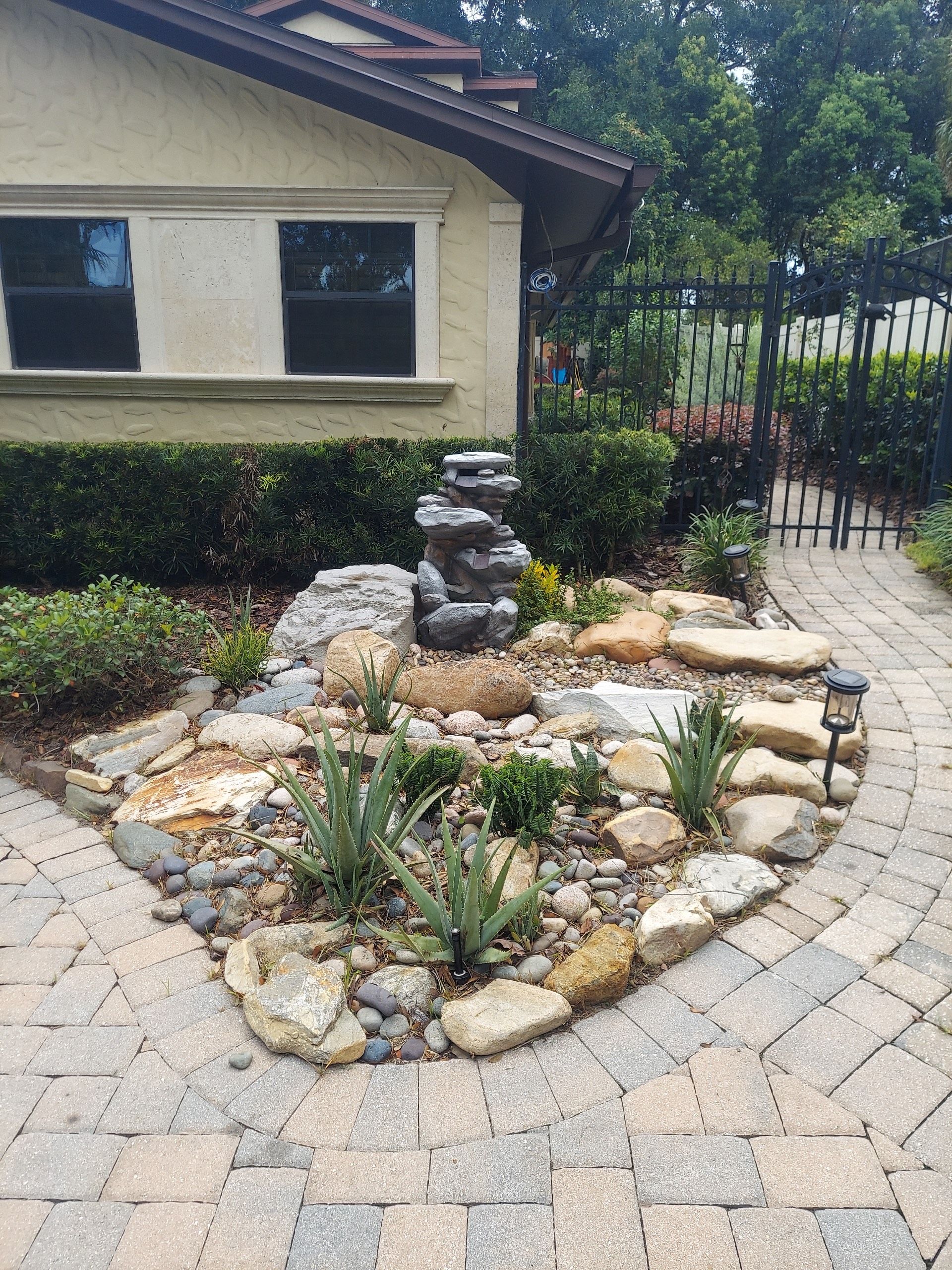 overgrown vegetation removed with professional landscape maintenance