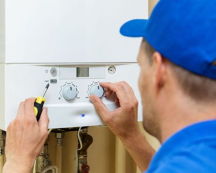 Plumber Installing Water Heater — Danville, AL — Express Rooter & Lamco Plumbing
