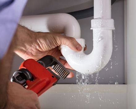Plumber Repairing Sink — Danville, AL — Express Rooter & Lamco Plumbing