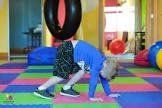 A kid doing a bear crawl