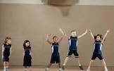 Kids doing jumping jacks