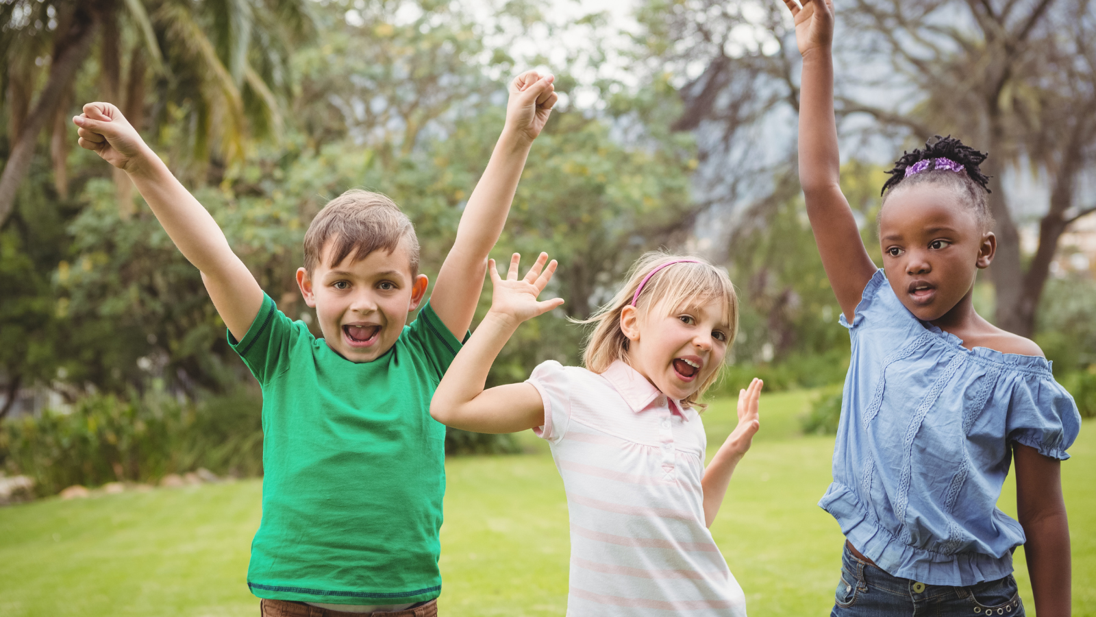 Three kids cheering