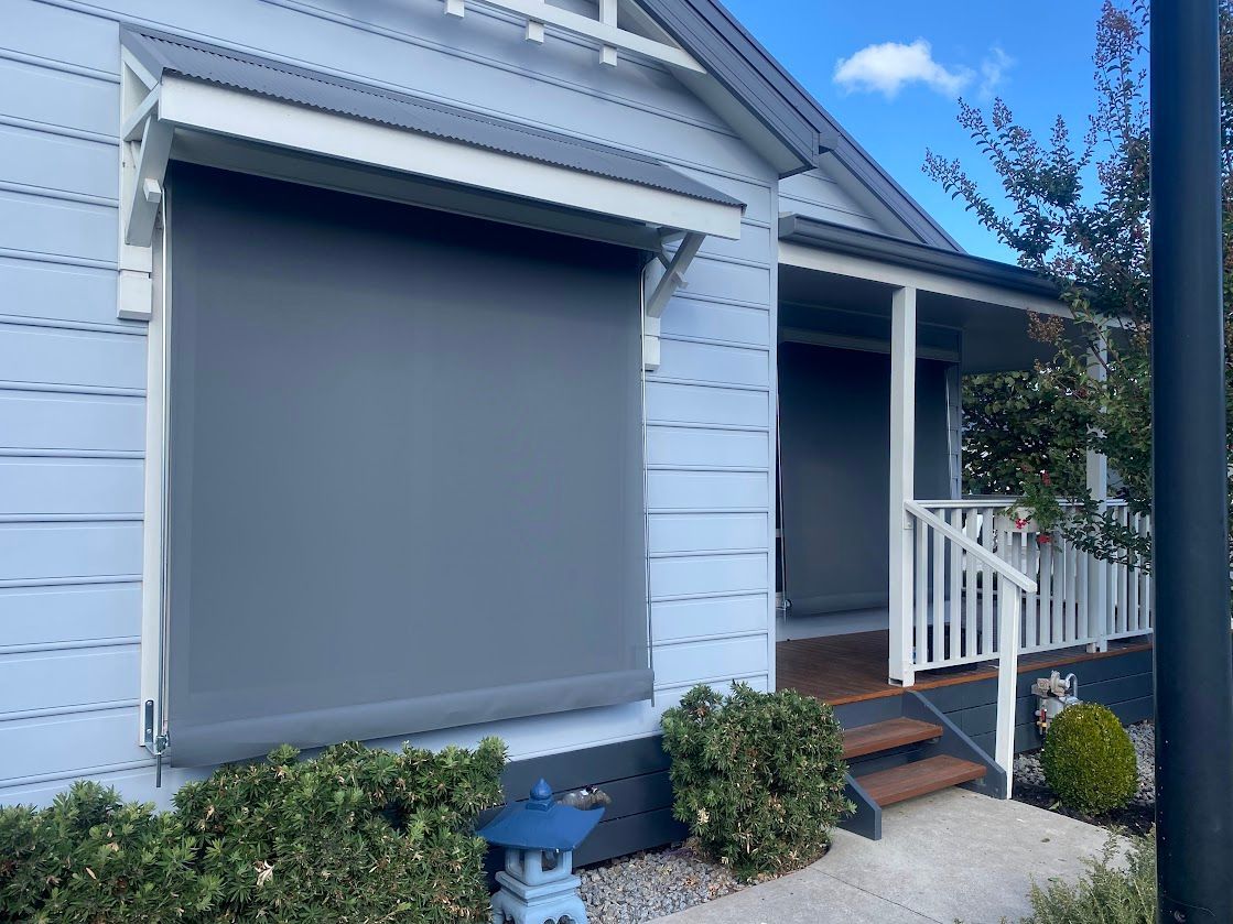 A Window With A Blind On It And A Picture Of A Field In The Background — Night & Day Blinds and Awnings in Pakenham, VIC