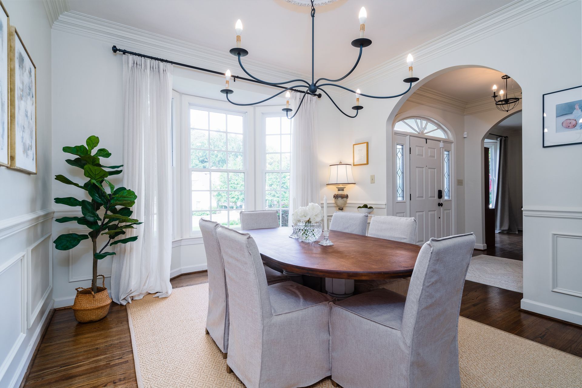 Neutral slipcovers on a set of dining room chairs near Lutherville, Maryland (MD)