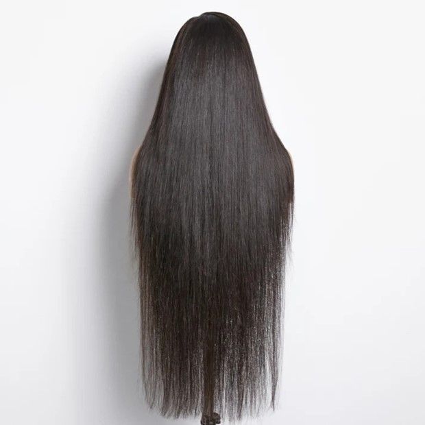 The back of a long wig is shown on a white background.