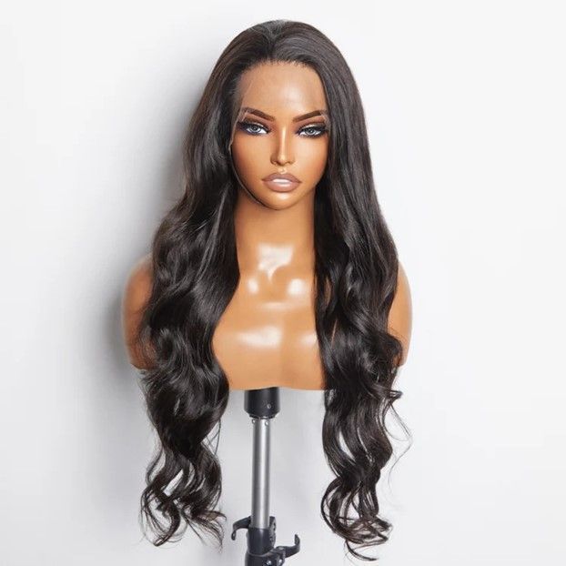 A mannequin head with a wig on it