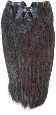 A close up of a bunch of hair extensions on a white background.