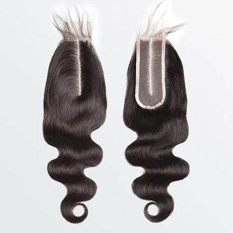 A pair of hair extensions with a lace closure on a white background.