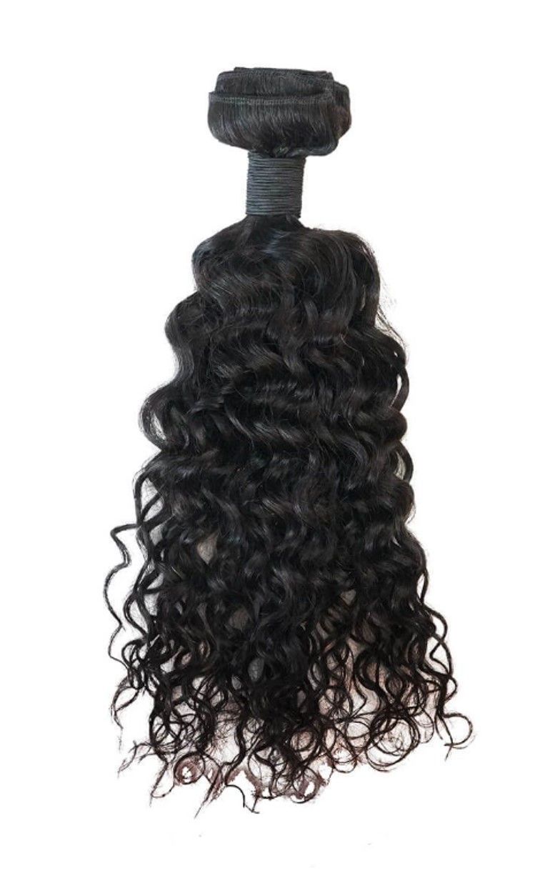A close up of a bundle of curly hair on a white background.