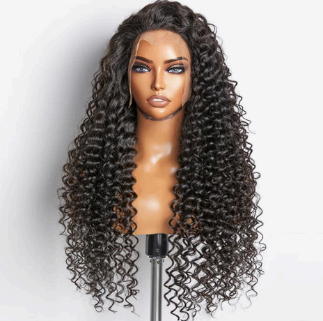 A wig with curly hair is on a mannequin head.