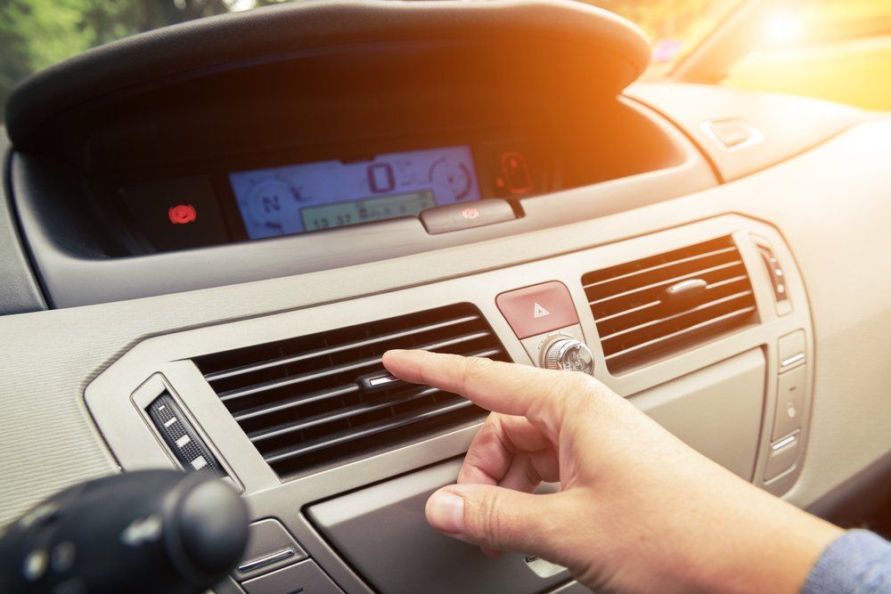 Driver Hand Tuning Air Ventilation Grille — Edmonton Car Air in Bentley Park, QLD