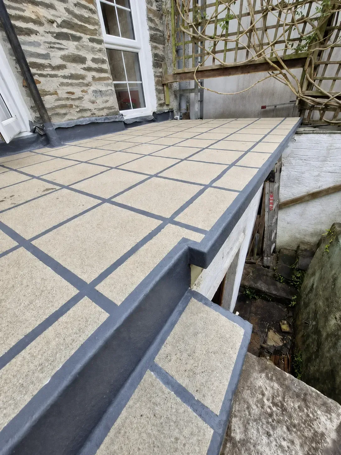 Finished roof terrace surface with sealed joints and edge detailing