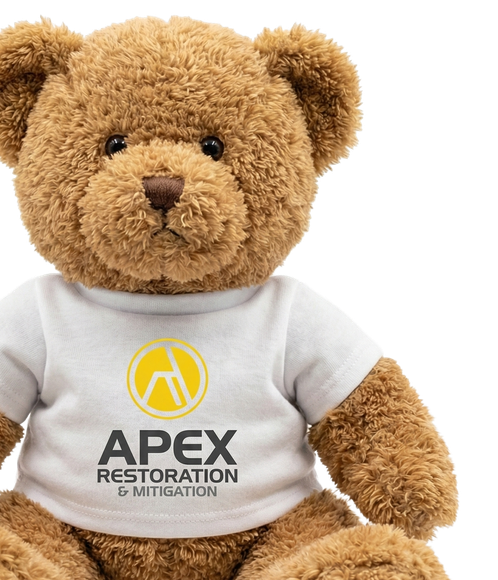 Teddy bear wearing a white t-shirt with 