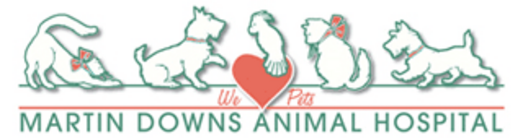 A logo for martin downs animal hospital with cats and dogs and a heart.