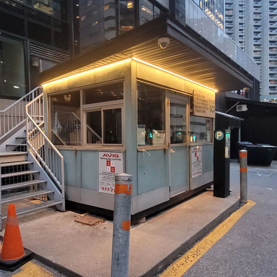 A building with stairs and a sign that says ' ambulance ' on it