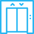 Blue elevator with up and down arrows above the doors. Two indicator lights are visible.