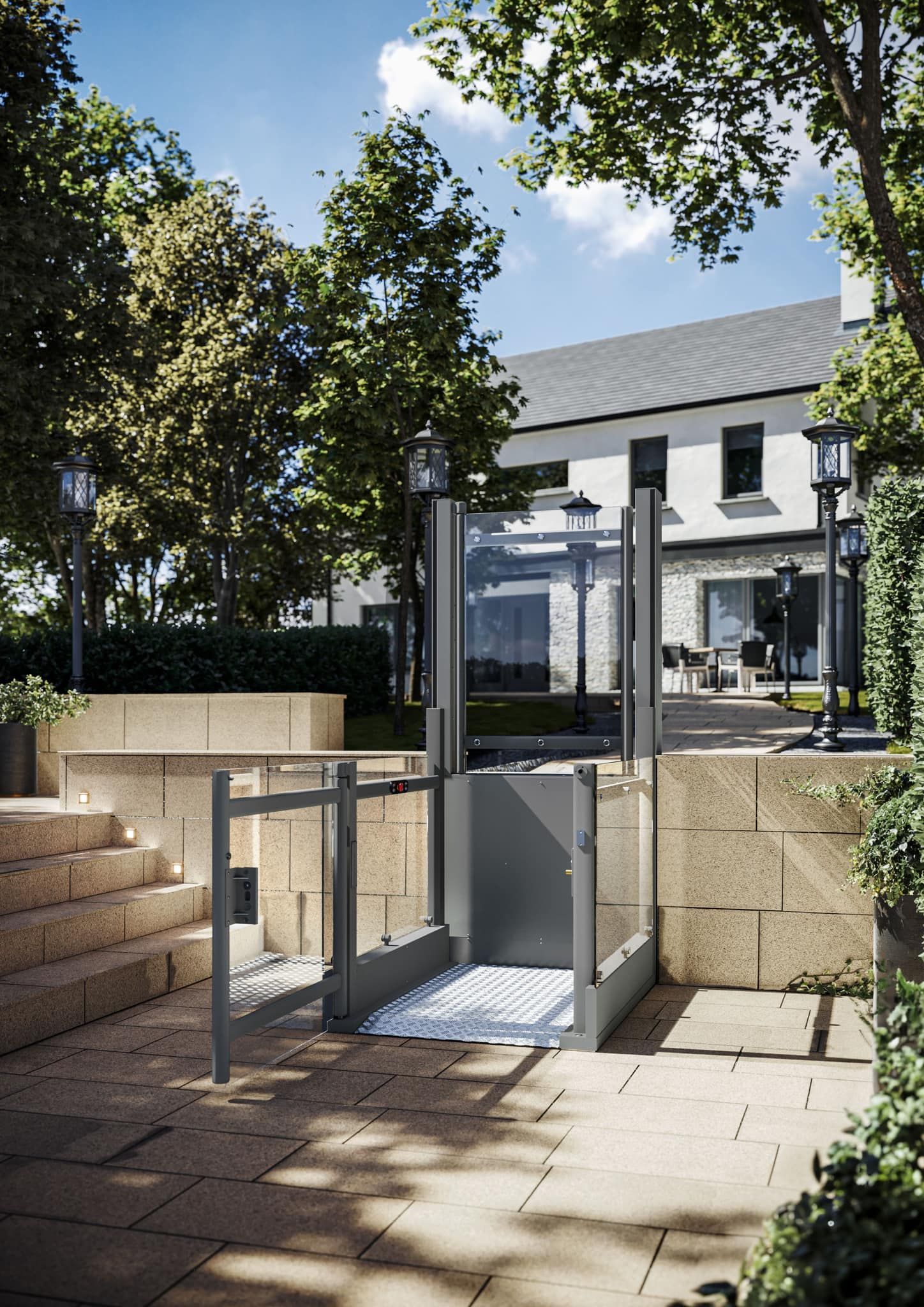 Outdoor platform lift next to stone stairs, providing accessibility to a patio area.