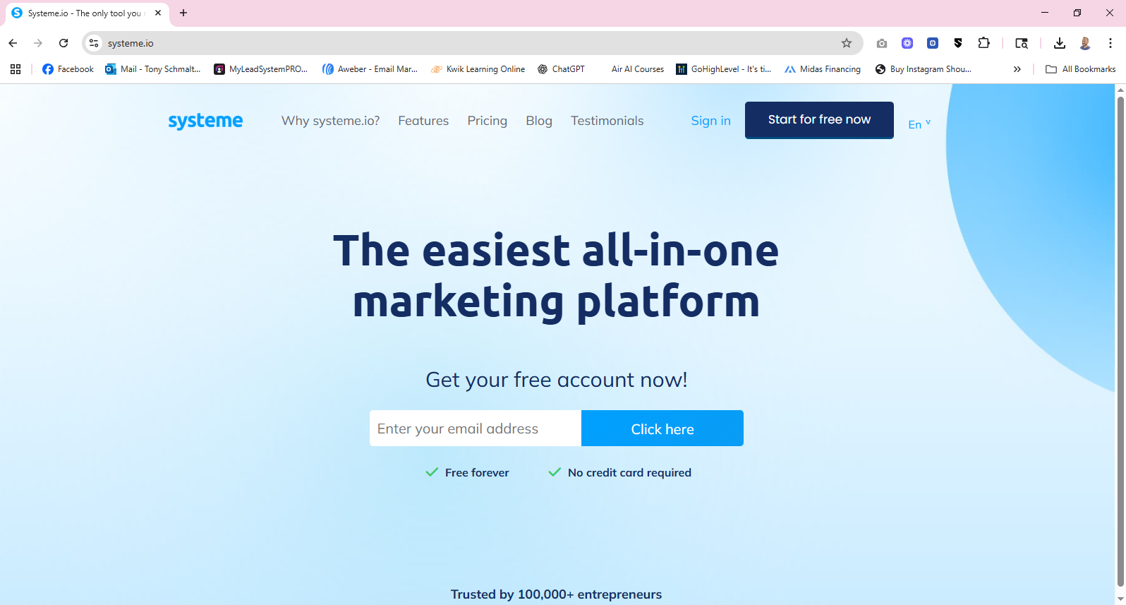 Website for Systeme.io marketing platform, with signup buttons on a blue and white background.