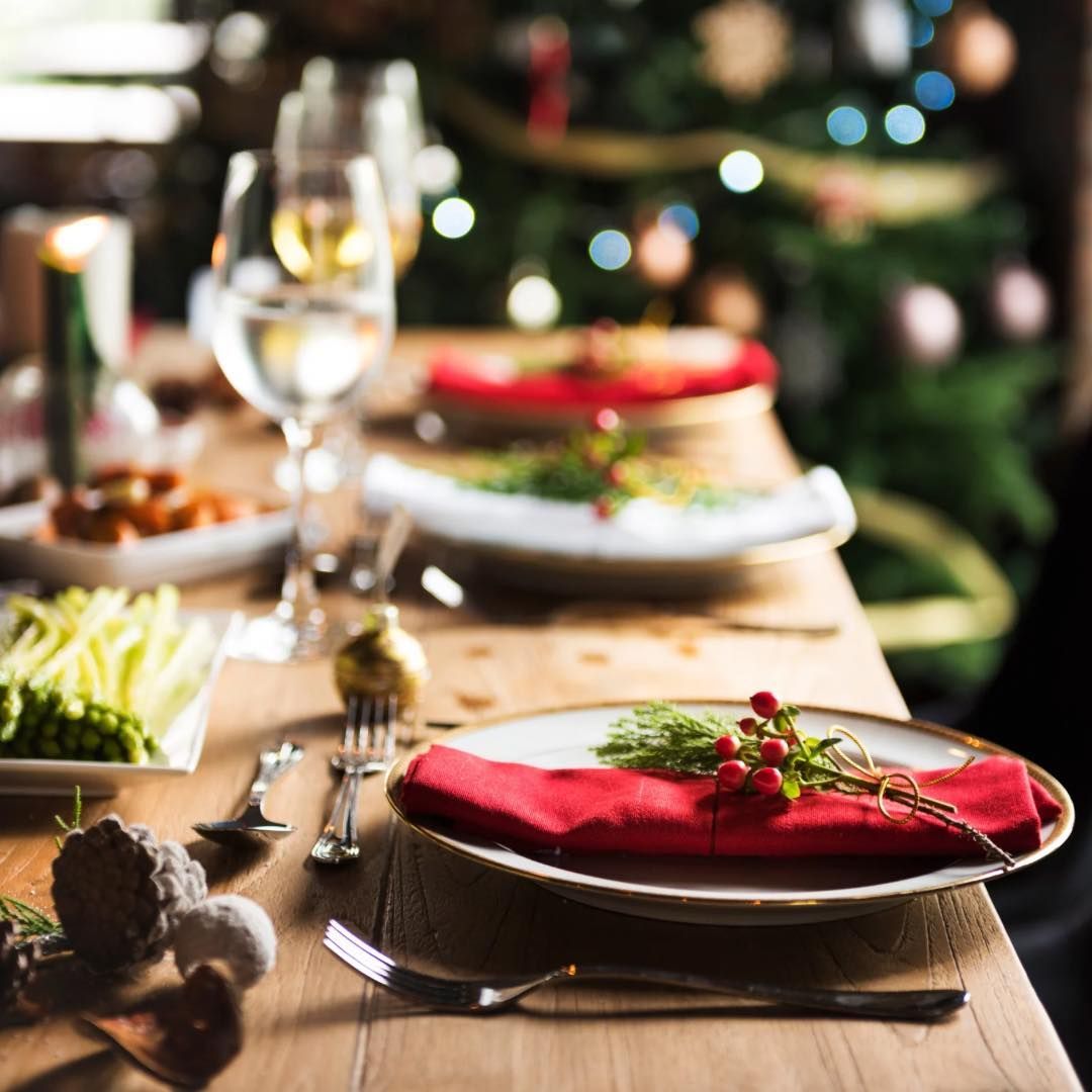 A Table Set for A Christmas Dinner with Plates and Silverware — Every Occasion Catering in Currabubula, NSW