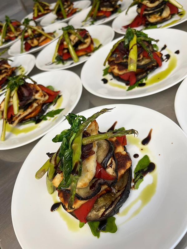 A Bunch of Plates of Food with Vegetables on Them — Every Occasion Catering in Currabubula, NSW