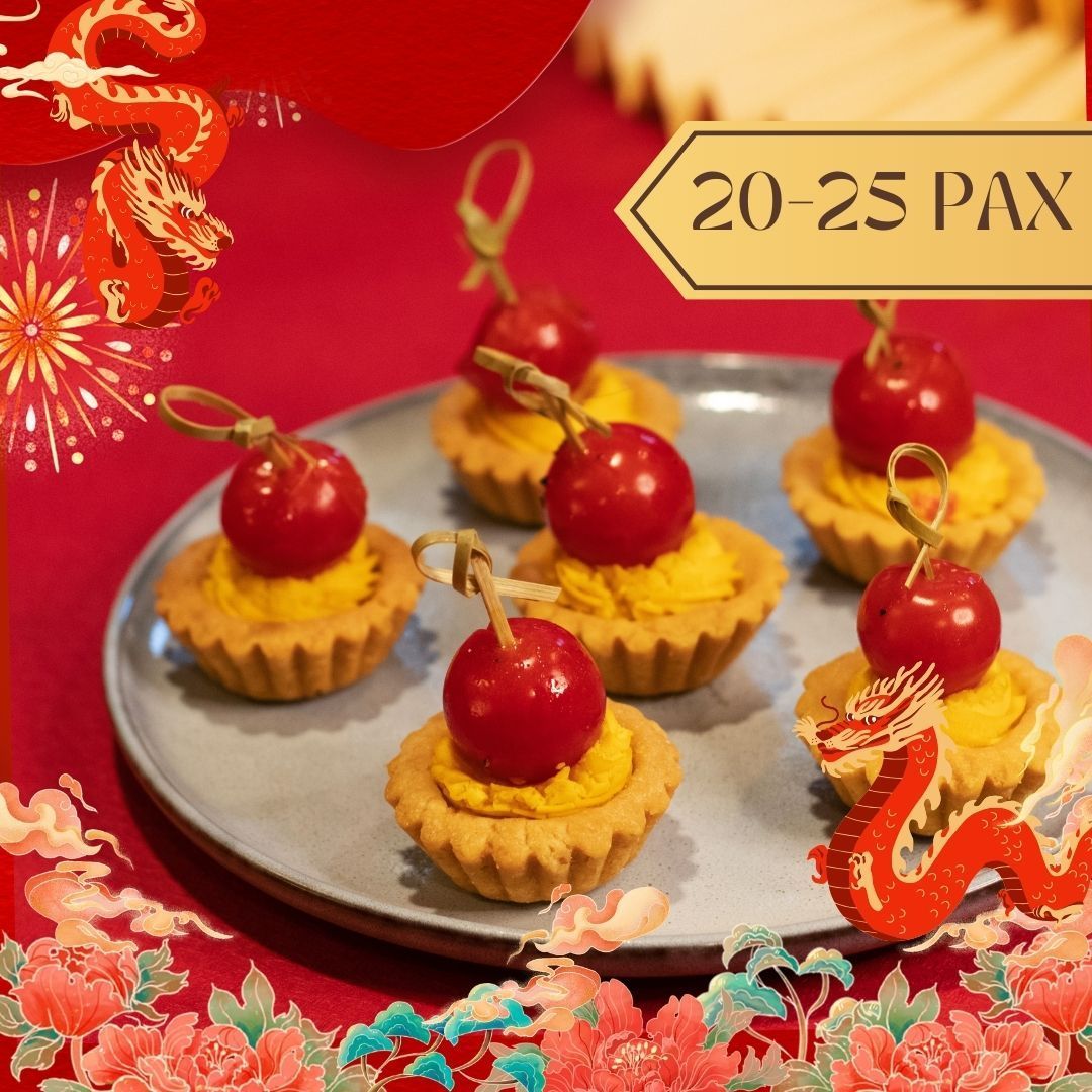 Small tarts topped with orange filling and cherry tomatoes, skewers. Plated, red background with dragon and text