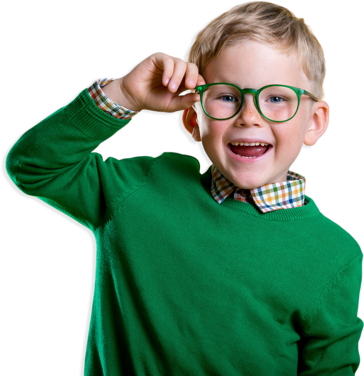 Smiling child in a green sweater adjusting green glasses on a white background