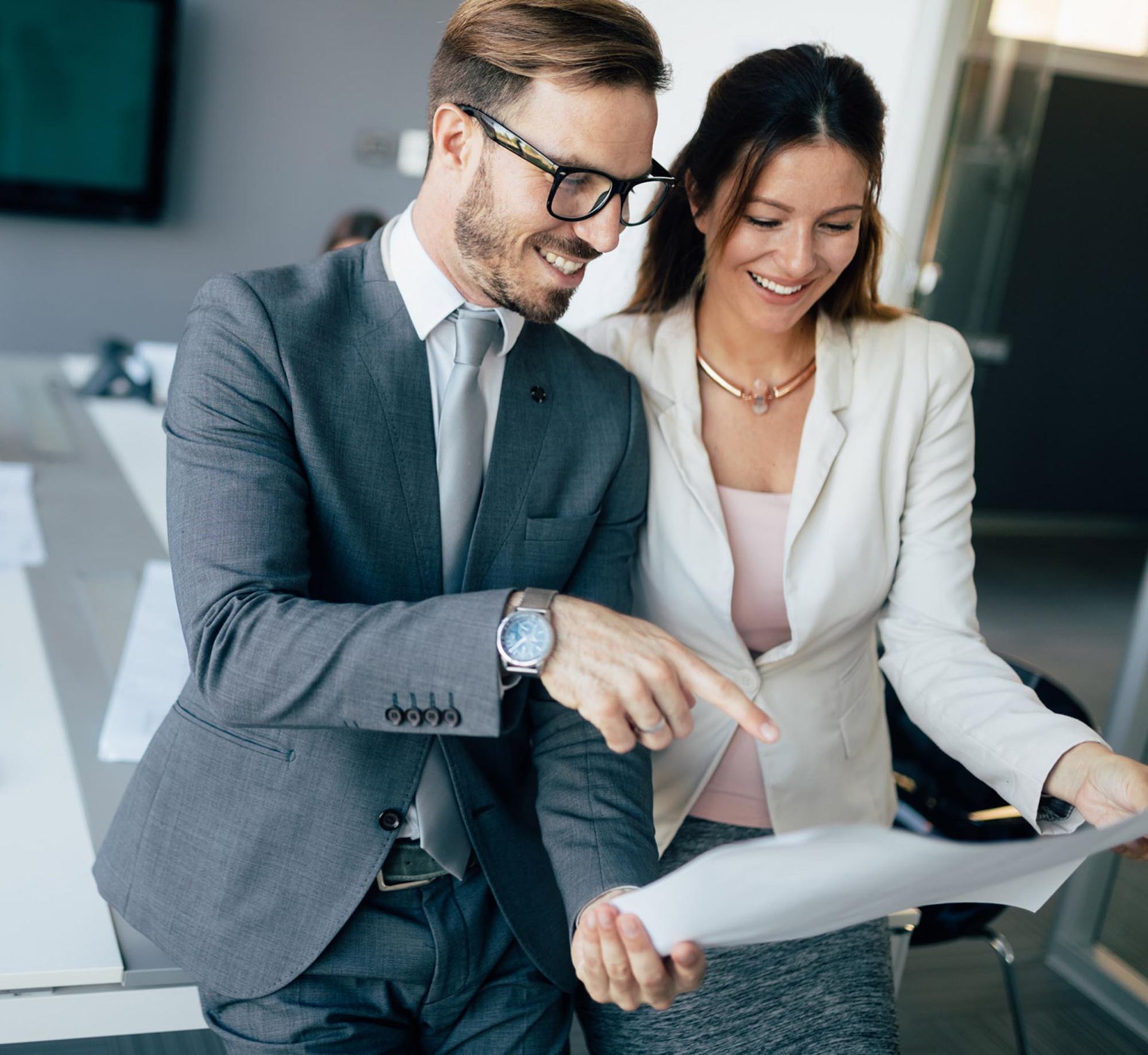 A person is holding the word insurance in their hand.