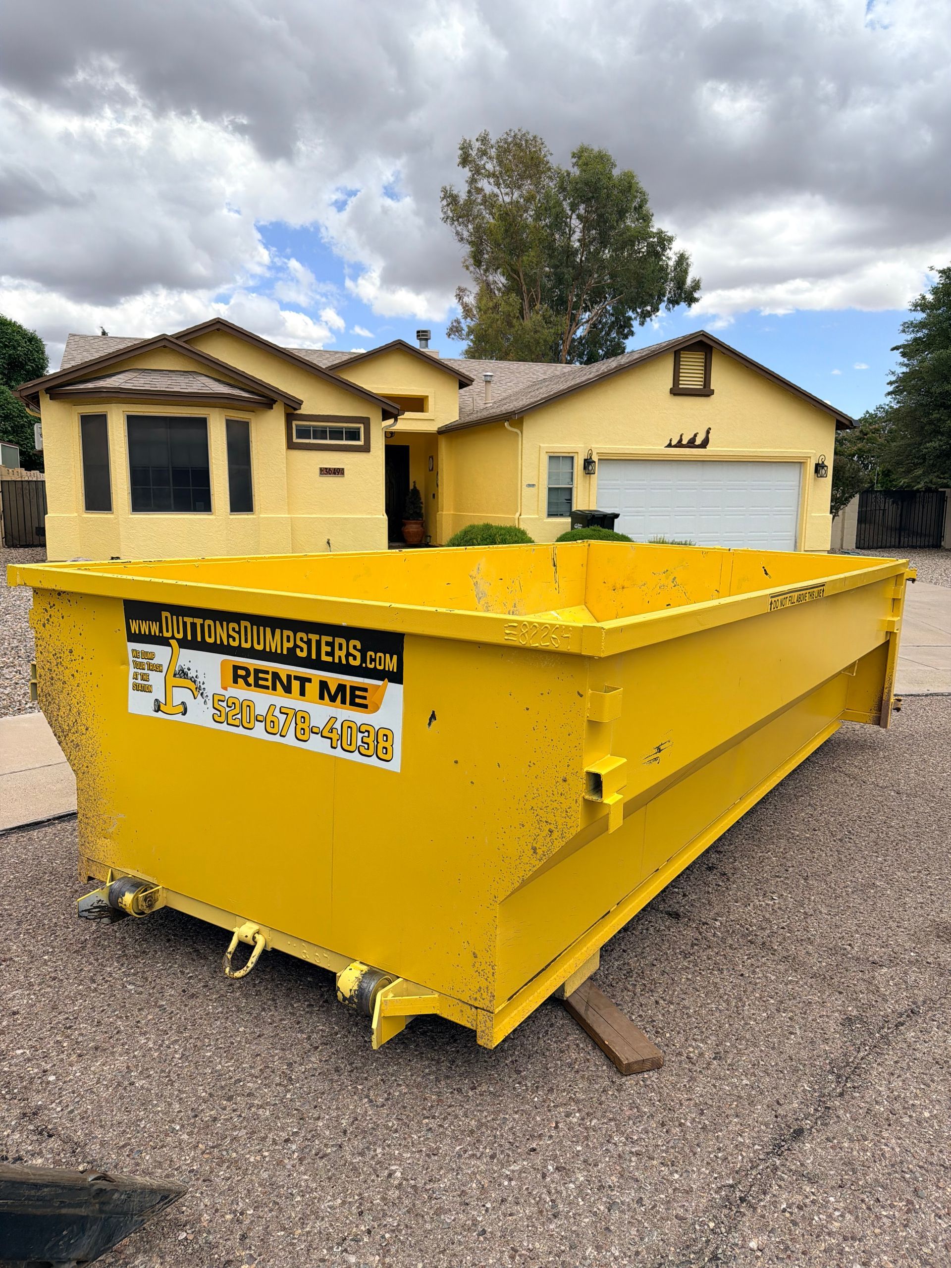 15 yard roll-off dumpster from Dutton's Dumpsters
