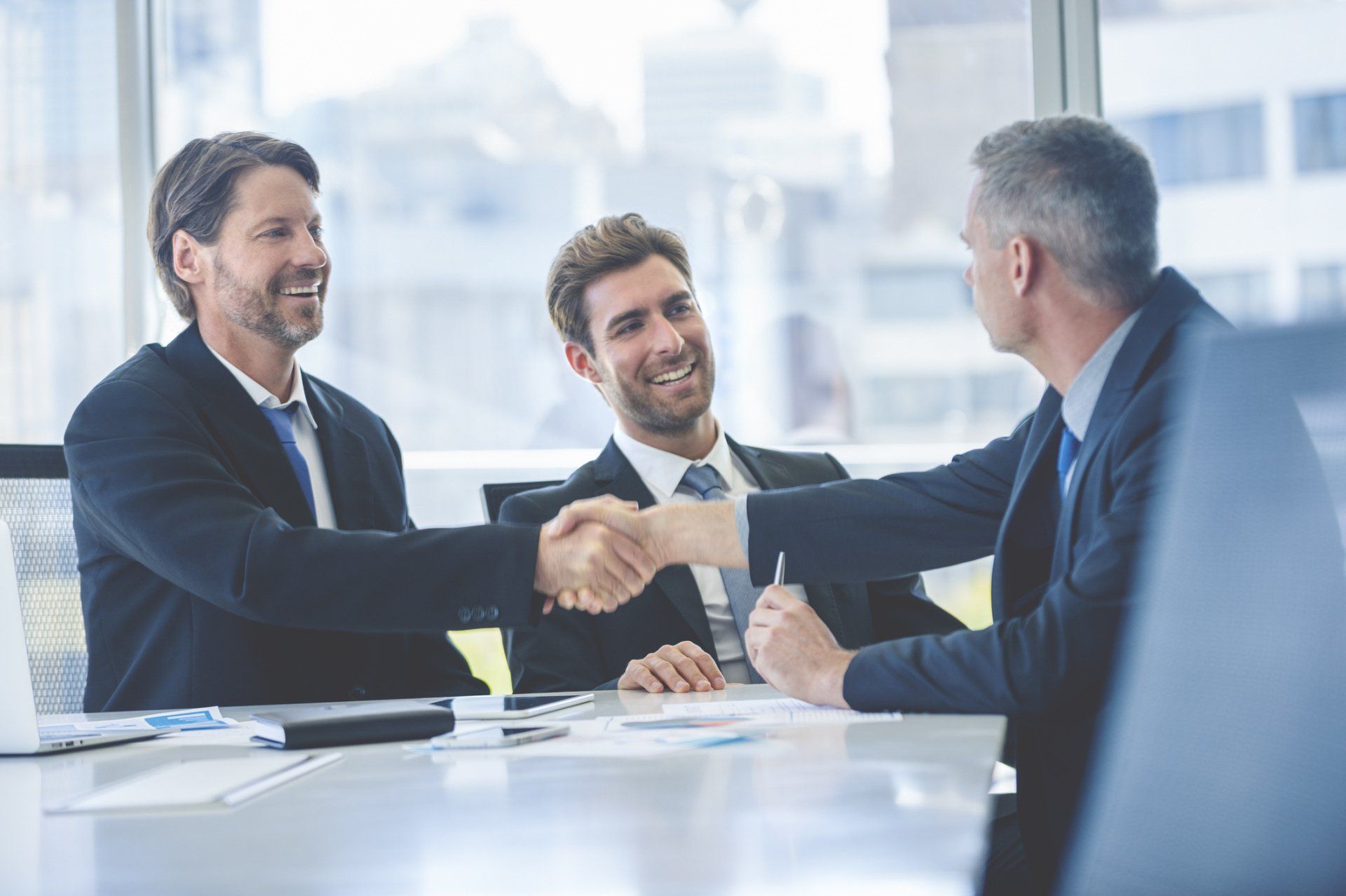 Lawyer And Client Handshake — Jefferson City, MO — Reed Law