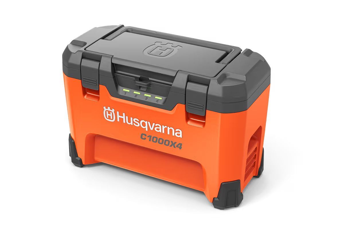 Orange And Black Husqvarna C1000x4 Battery — Tuggerah Outdoor Power in Tuggerah, NSW
