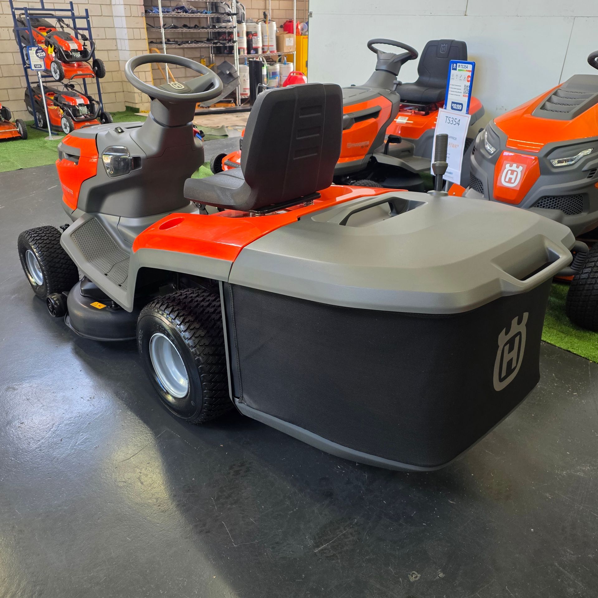 A Husqvarna Riding Lawn Mower With a Rear Collection Bag — Tuggerah Outdoor Power in Tuggerah, NSW