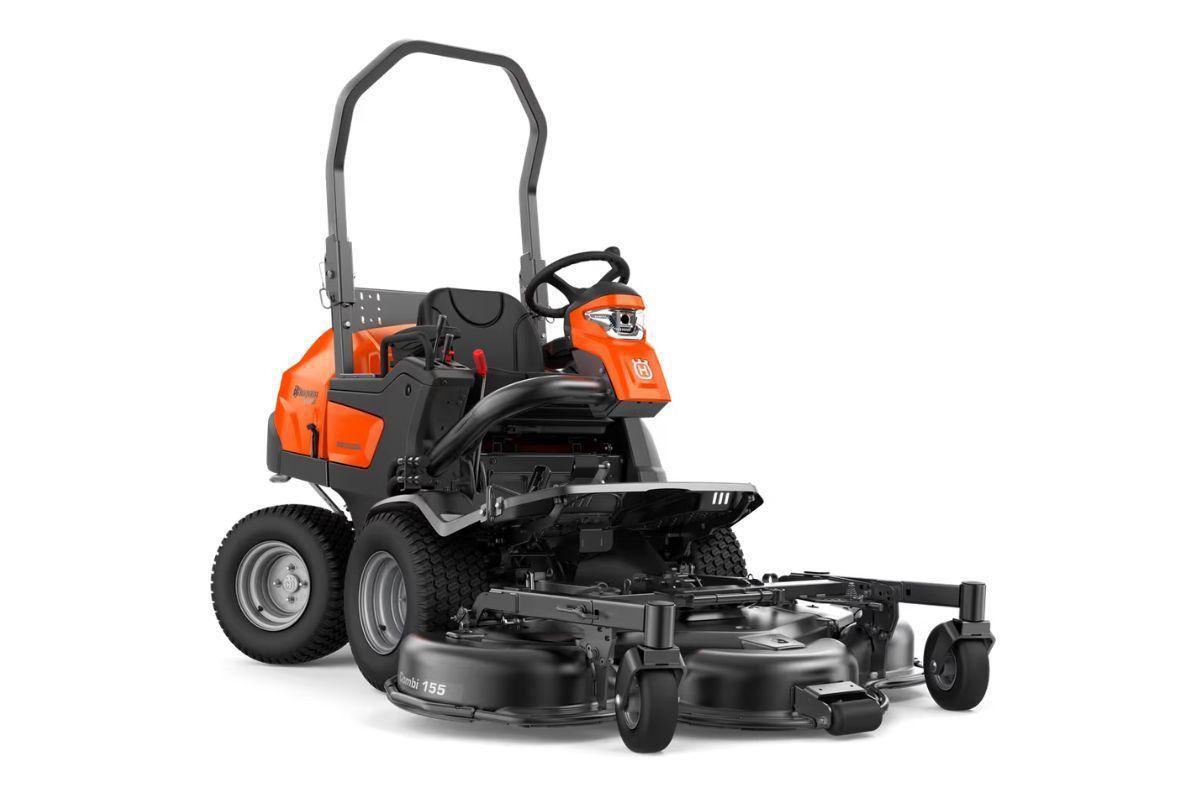 Orange And Black Husqvarna Stand-on Mower — Tuggerah Outdoor Power in Tuggerah, NSW