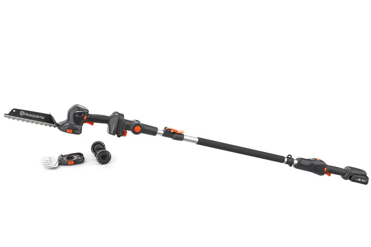 Black And Orange Telescoping Pole Hedge Trimmer — Tuggerah Outdoor Power in Tuggerah, NSW
