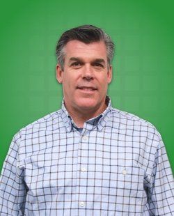 Doug Reach in a flannel shirt.