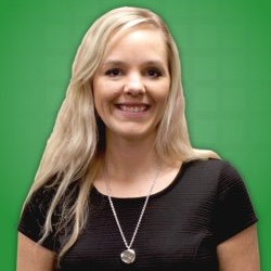 Mia Richards in a black shirt, smiling.