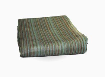A folded shade fabric tarp.