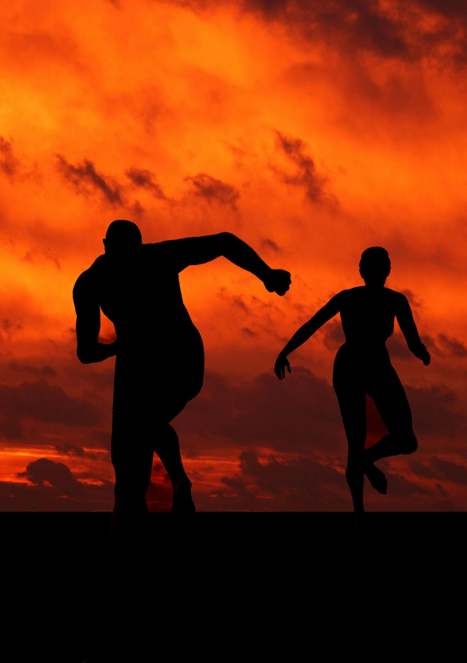 Two Runners, running at sunset