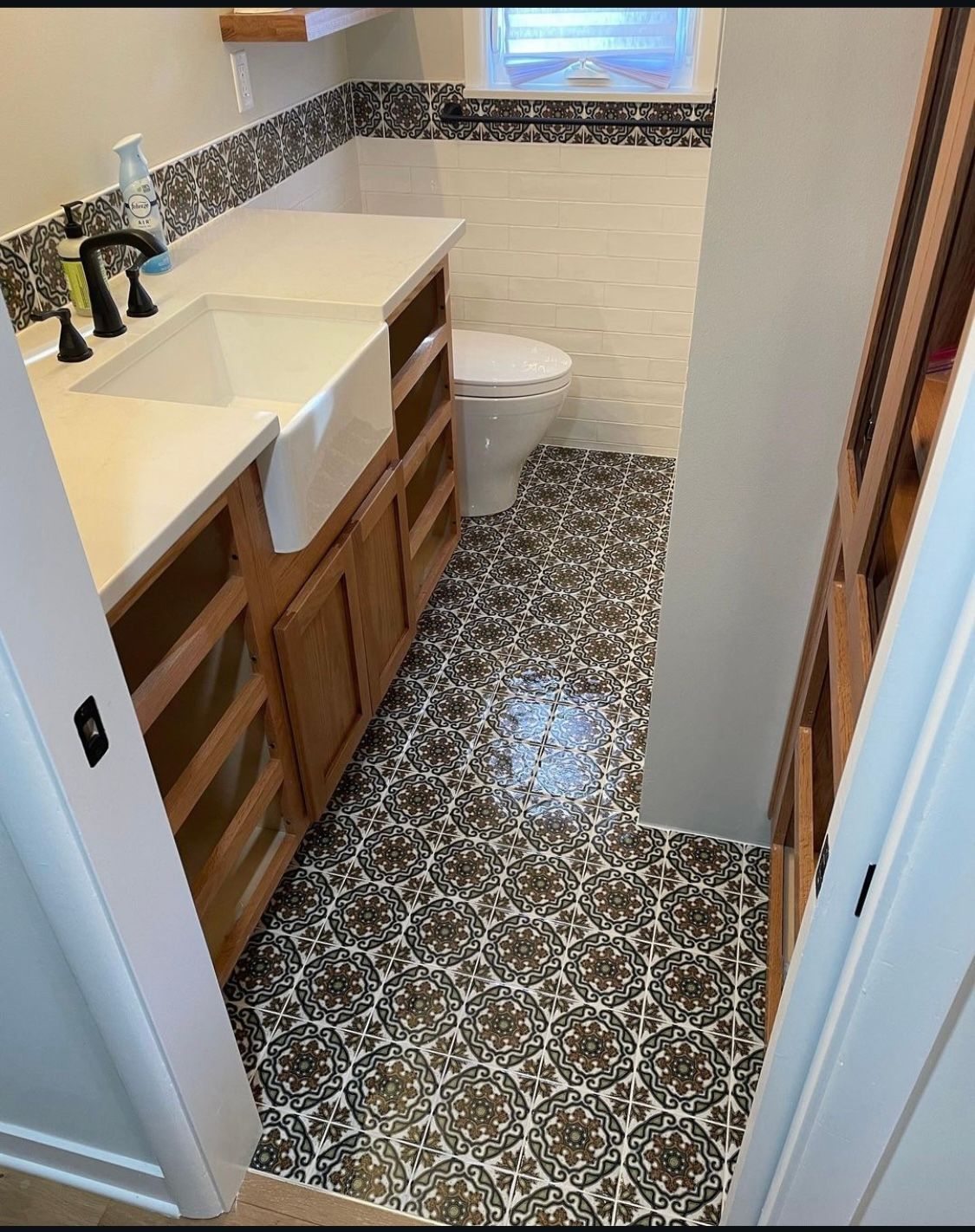 A picture of a renovated bathroom with patterned tiles in Fairwood, WA