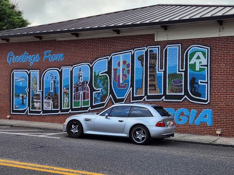 Car with Graffiti Background | Mountain European Auto Repair