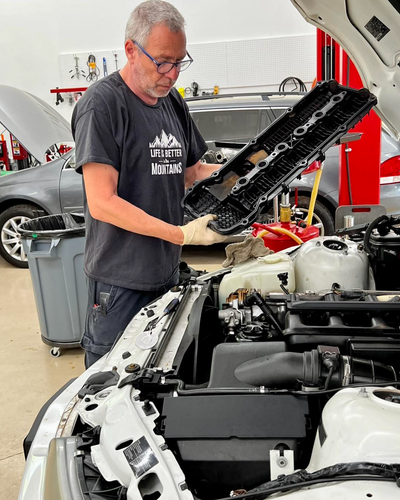 Crew member doing diagnostic work | Mountain European Auto Repair