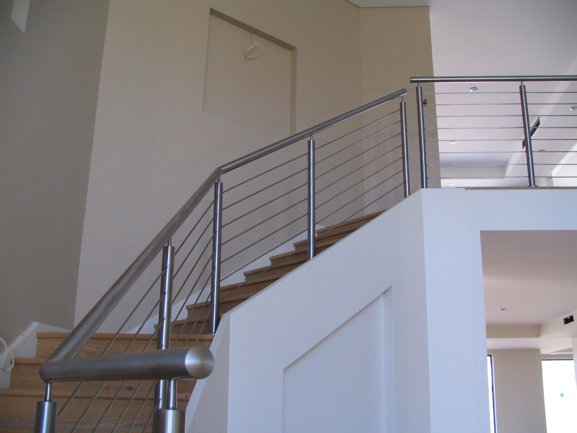 Modern Indoor Staircase With Sleek Balustrade