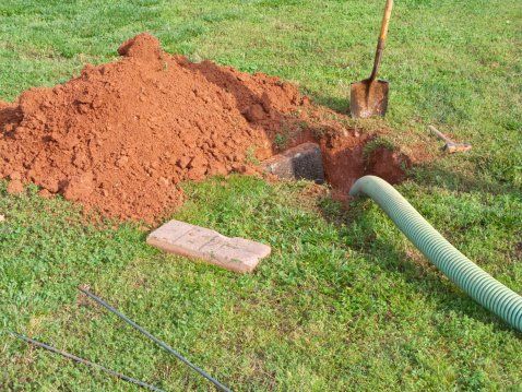 Pumping Open Septic Tank in Yard | Coloma, MI | A-Abe Septic Tank Service