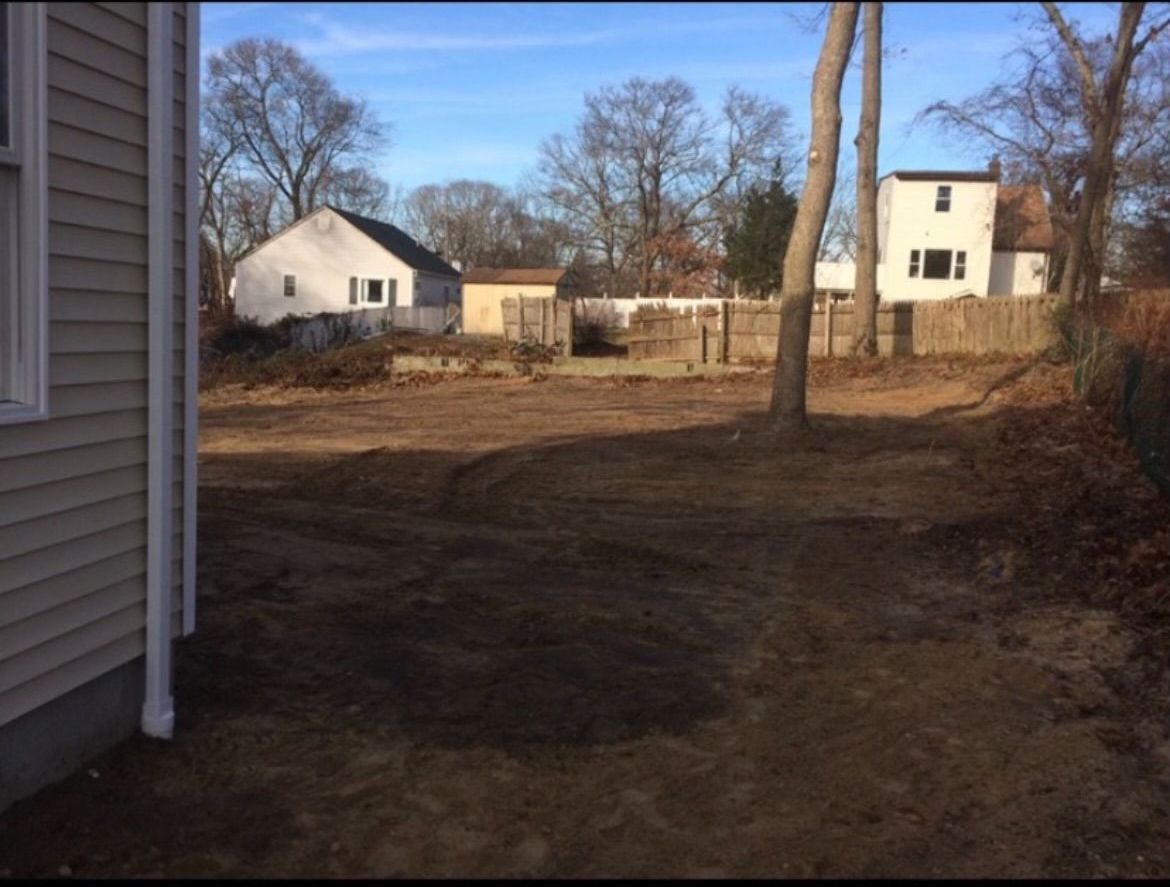 Backyard after clearing and grading, like a new backyard