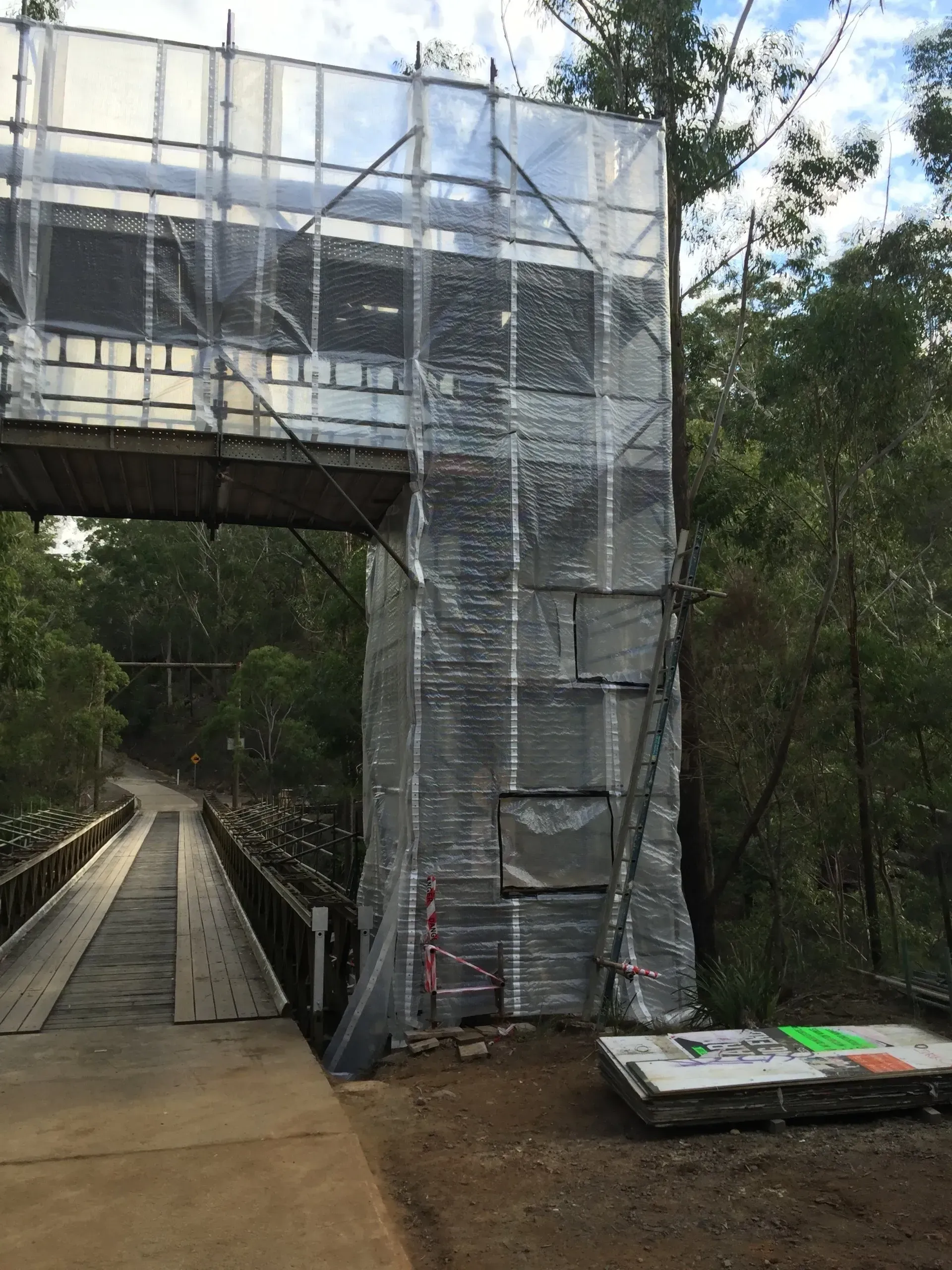 scaffolding on the entryway of a bridge