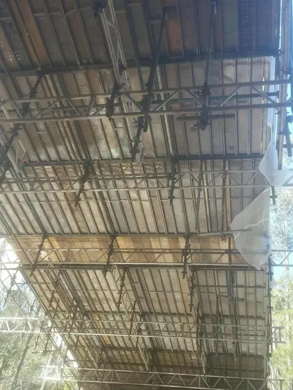 the scaffolding under a bridge construction project